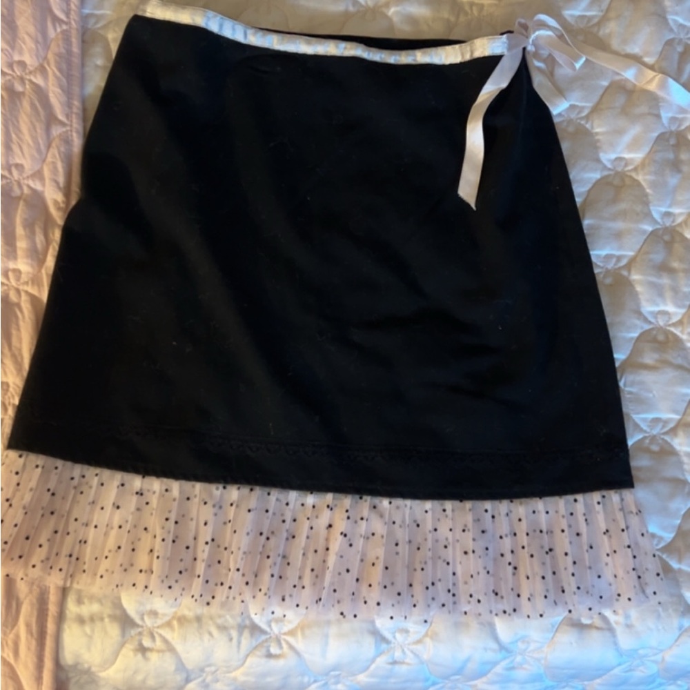 Elegant Black and White Skirt with Polka Dot Trim